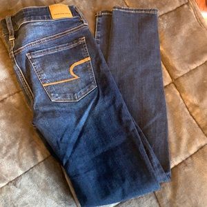 american eagle dark wash ripped jeans